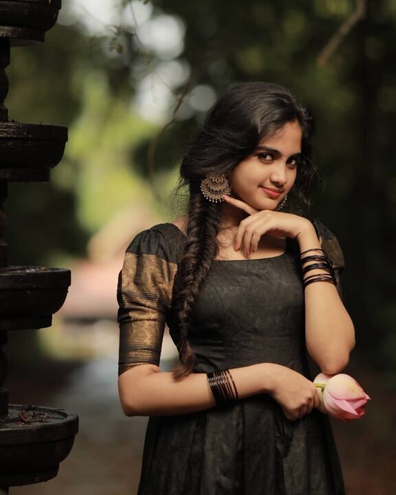 Devika Sanjay stills in black traditional Kerala dress