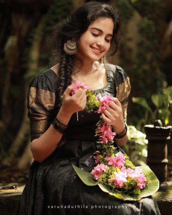 Devika Sanjay stills in black traditional Kerala dress