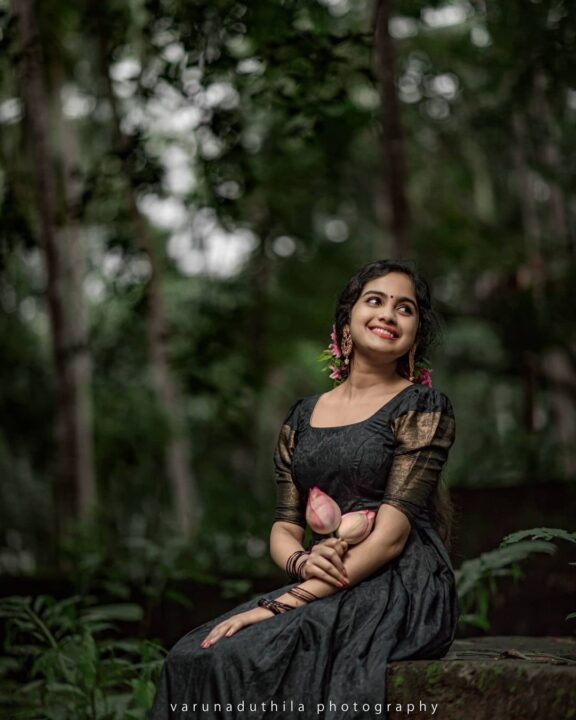 Devika Sanjay stills in black traditional Kerala dress