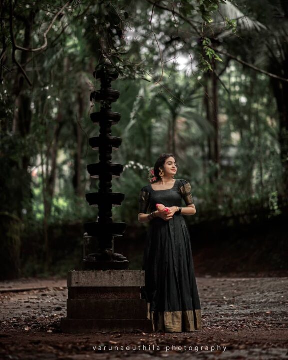 Devika Sanjay stills in black traditional Kerala dress