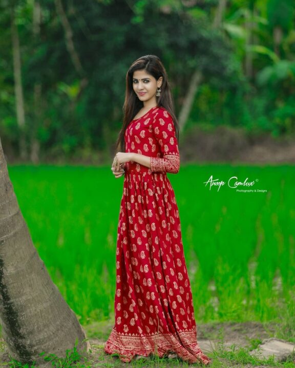 Kerala actress Krishnendhu Unnikrishnan in ethnic wear gown stills