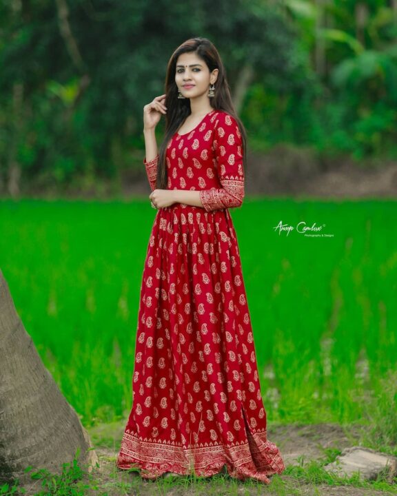 Kerala actress Krishnendhu Unnikrishnan in ethnic wear gown stills