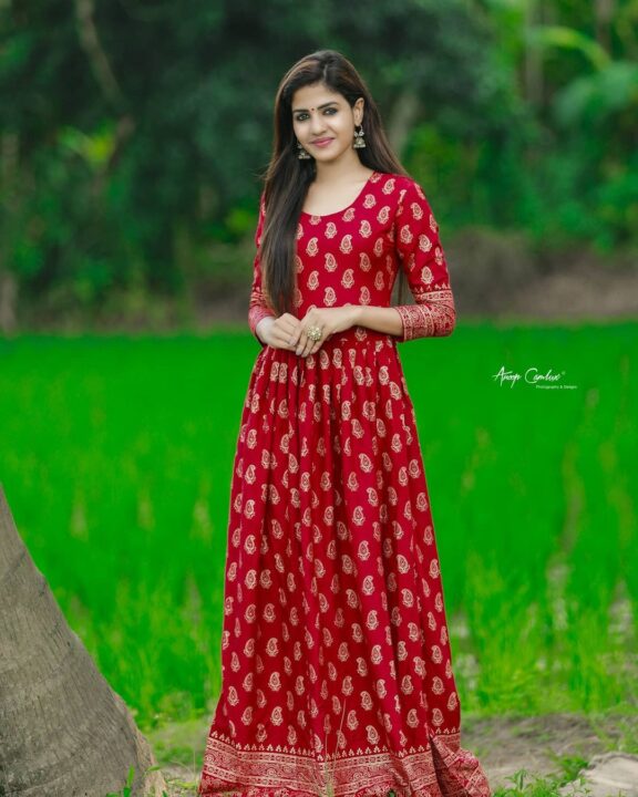 Kerala actress Krishnendhu Unnikrishnan in ethnic wear gown stills