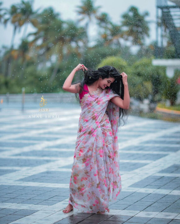 Malayalam actress Monisha Arshak saree stills in rain