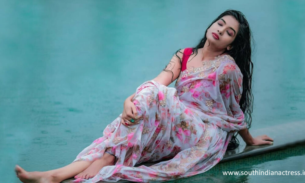 Malayalam actress Monisha Arshak saree stills in rain