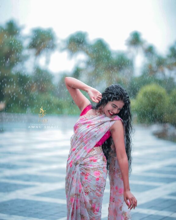 Malayalam actress Monisha Arshak saree stills in rain