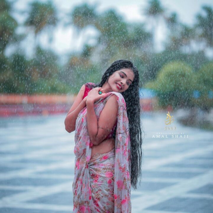 Malayalam actress Monisha Arshak saree stills in rain