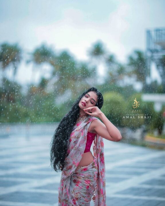 Malayalam actress Monisha Arshak saree stills in rain