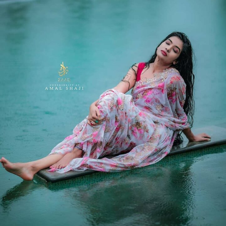 Malayalam actress Monisha Arshak saree stills in rain