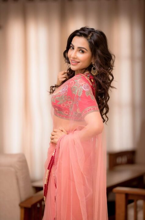 Parvati Nair hot pics in pink saree