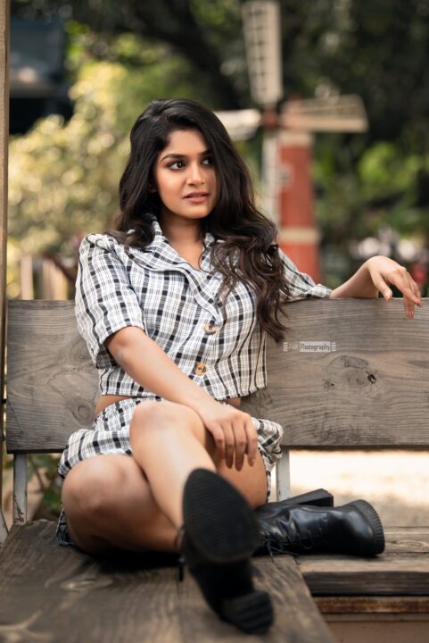 Sanjana Anand wearing check crop top and trousers