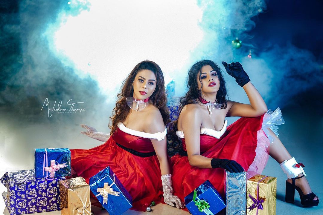 Ineya and her sister Swathi in Christmas outfit photos