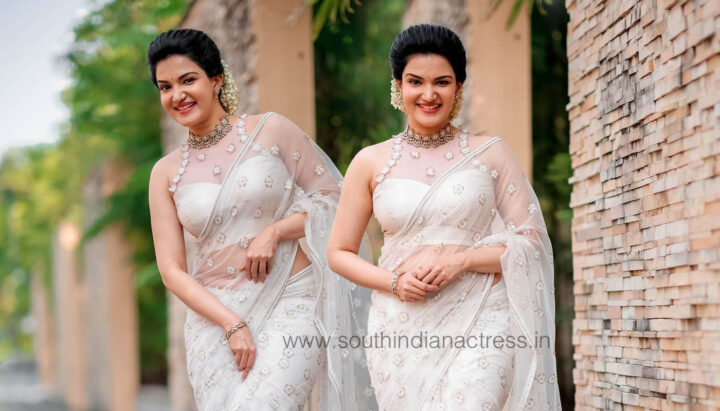 Honey Rose in transparent off white saree photos