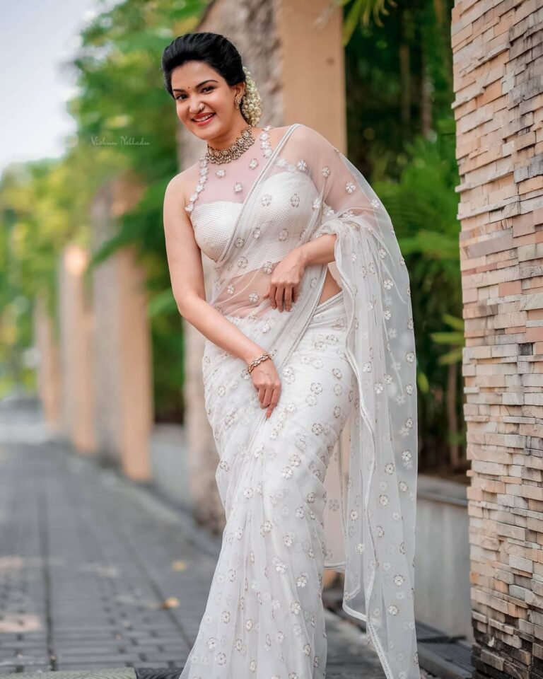 Honey Rose in transparent off white saree photos - South Indian Actress