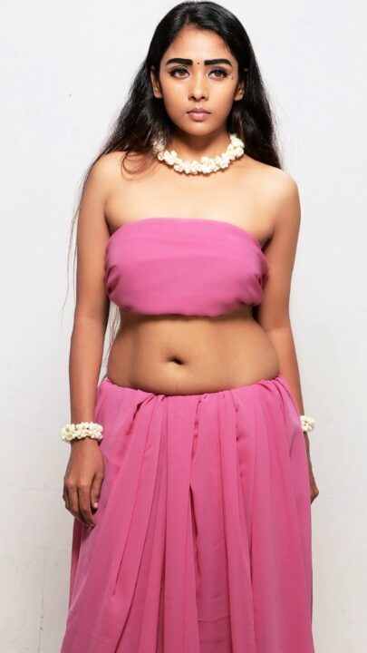 Actress Nimmy hot navel photos in pink outfit