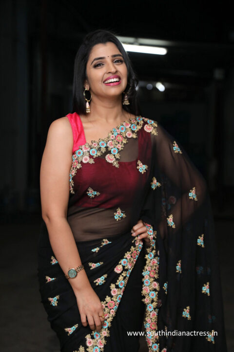 Anchor Syamala hot navel stills in black saree