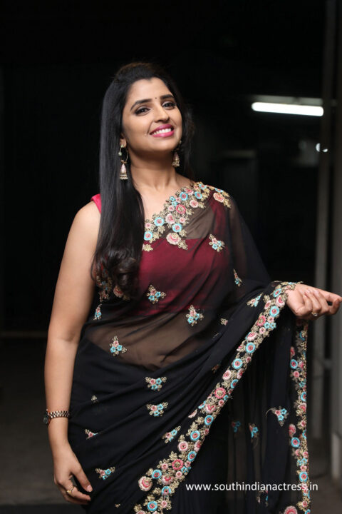 Anchor Syamala hot navel stills in black saree