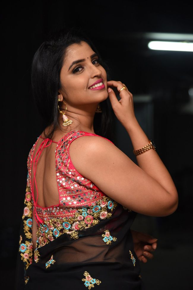 Anchor Syamala hot stills in black saree - South Indian Actress