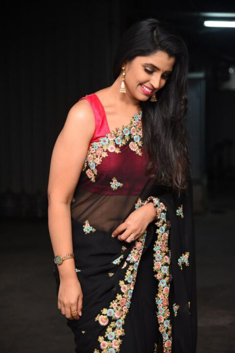 Anchor Syamala hot stills in black saree