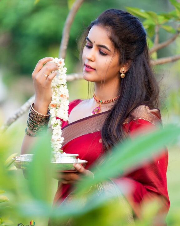 Chaitra Reddy in maroon silk saree photos