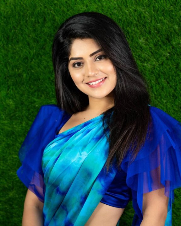 Megha Shetty in blue saree photoshoot stills