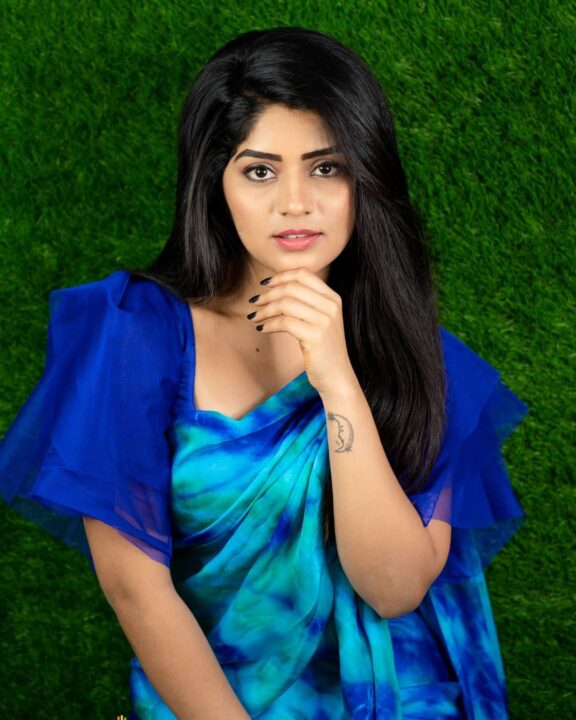 Megha Shetty in blue saree photoshoot stills