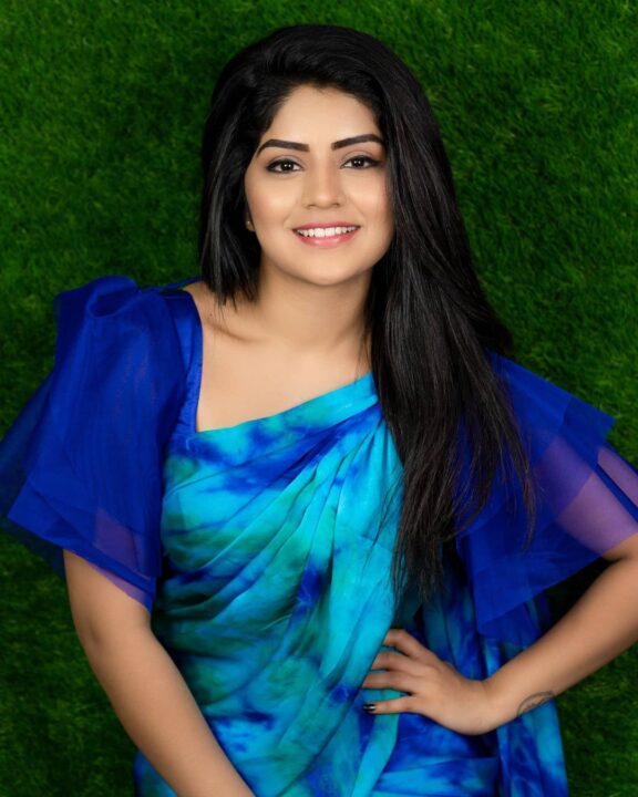 Megha Shetty in blue saree photoshoot stills