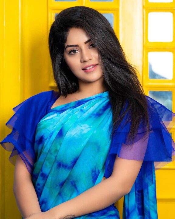 Megha Shetty in blue saree photoshoot stills