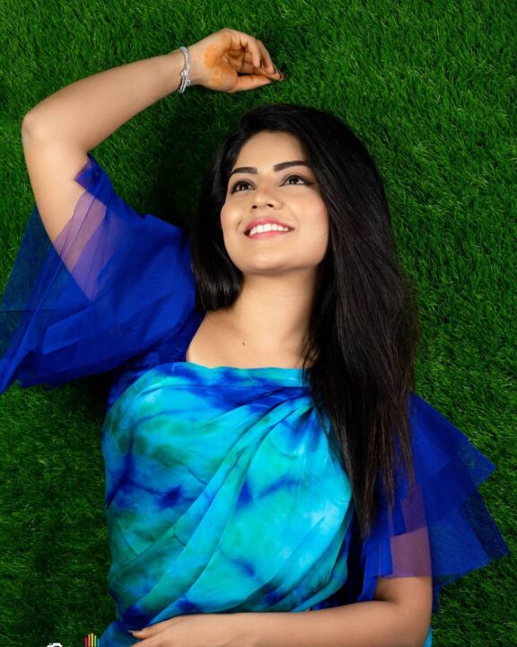 Megha Shetty in blue saree photoshoot stills