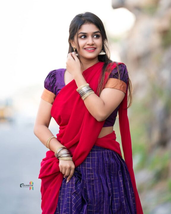 Sanjana Anand beautiful stills in half saree