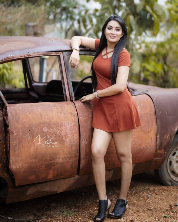 Bhanu Shree hot photoshoot stills in short dress