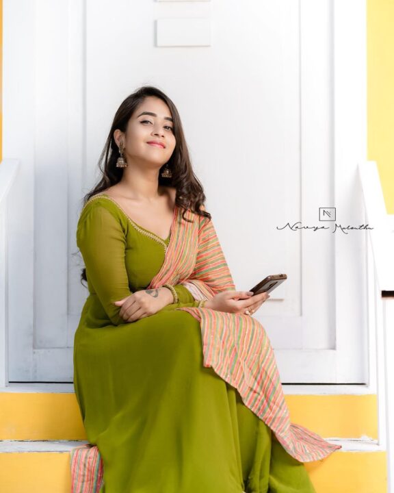 Deepthi Sunaina in green long frock photos