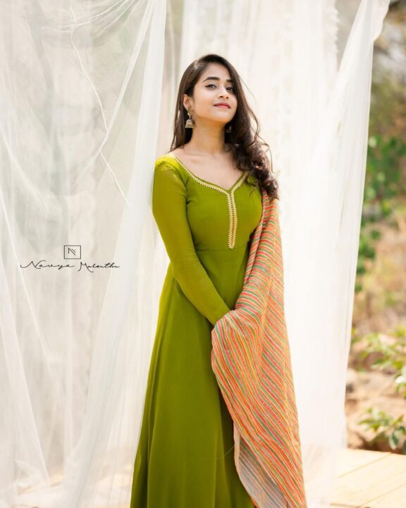 Deepthi Sunaina in green long frock photos