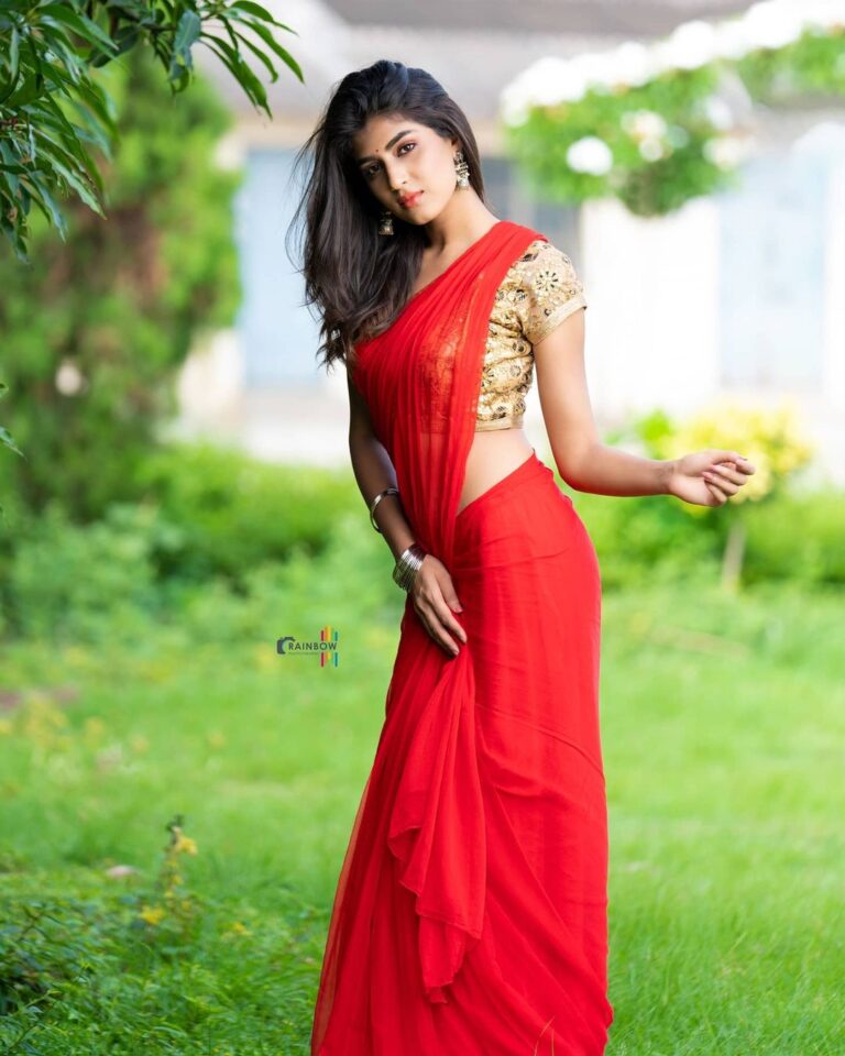 Divya Suresh photoshoot stills in red saree - South Indian Actress