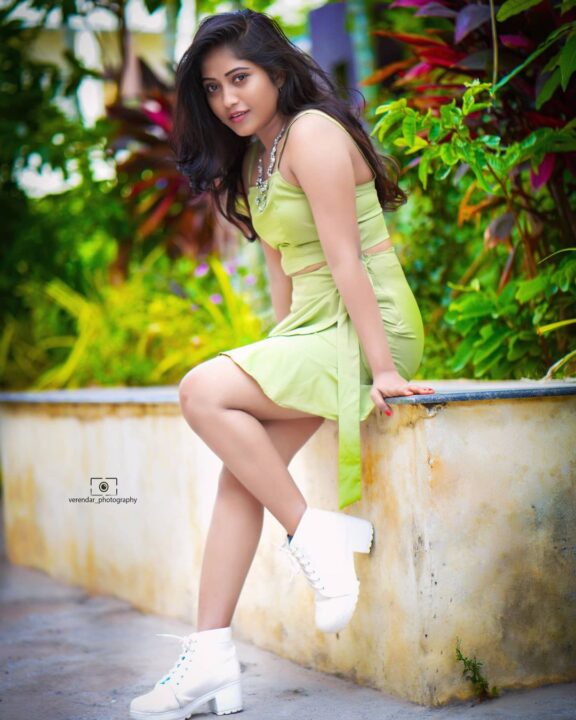 Kristen Ravali latest hot photoshoot stills in short dress