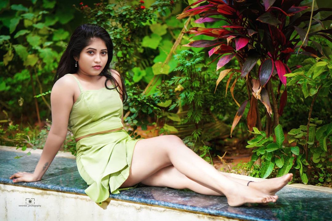 Kristen Ravali latest hot photoshoot stills in short dress