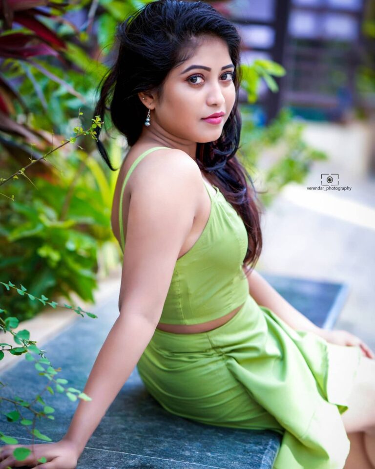 Kristen Ravali latest hot photoshoot stills in green dress