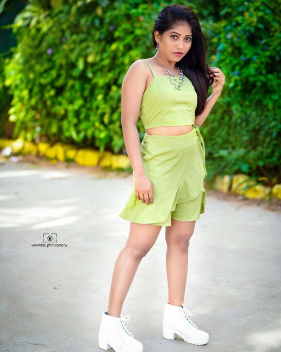 Kristen Ravali latest hot photoshoot stills in short dress