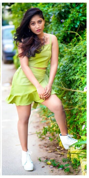 Kristen Ravali latest hot photoshoot stills in short dress