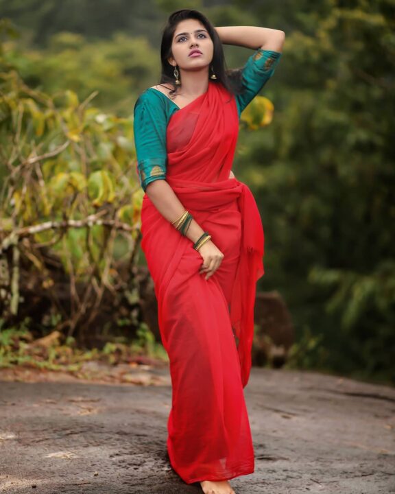 Maneesha Mahesh in red saree photos by photographer Bipin Krishnan