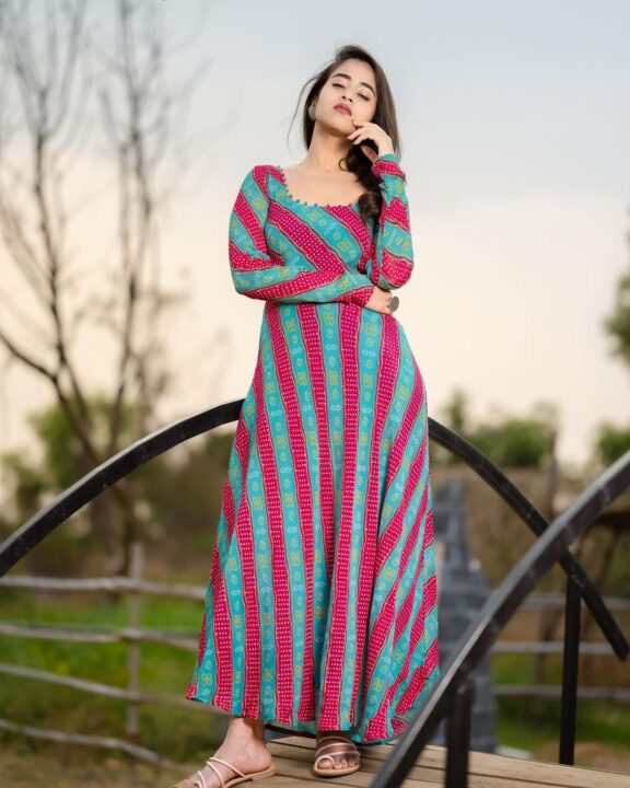 Deepthi Sunaina in long sleeve maxi dress photos