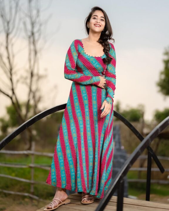 Deepthi Sunaina in long sleeve maxi dress photos