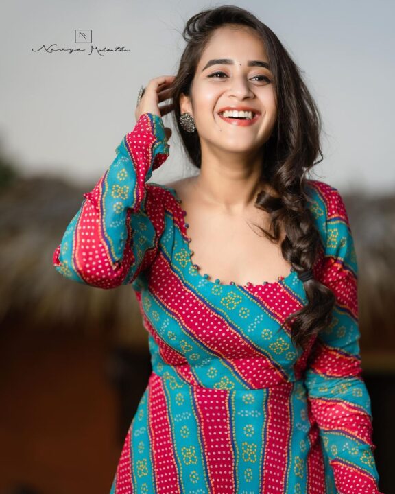 Deepthi Sunaina in long sleeve maxi dress photos