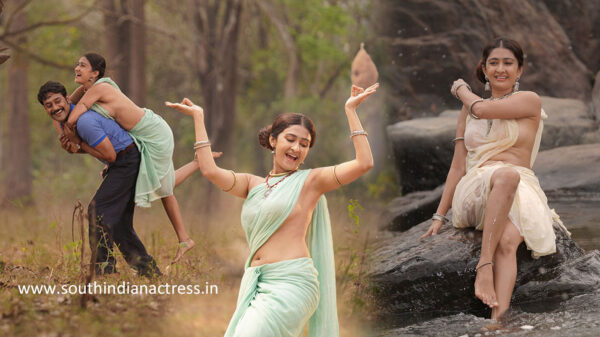 Farnaz Shetty stills in blouse-less saree from Induvadana movie