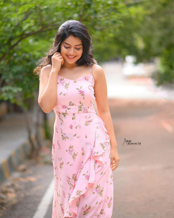 Megha Shetty stills in pink printed Maxi Dress