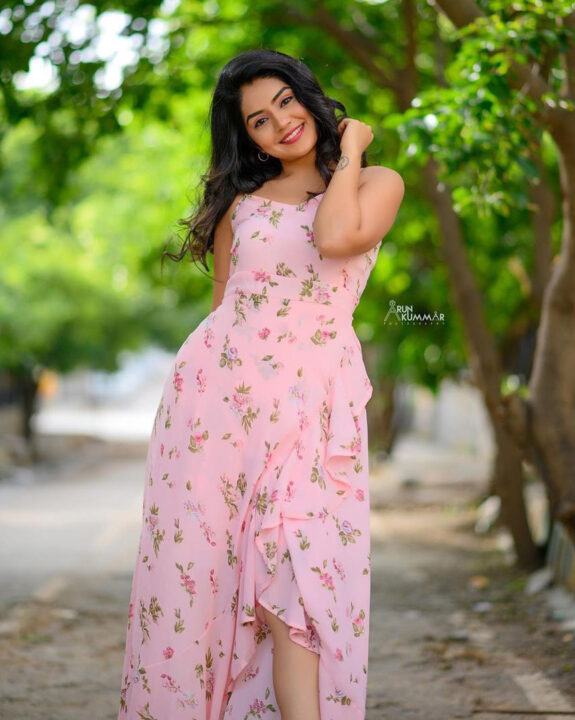 Megha Shetty stills in pink printed Maxi Dress