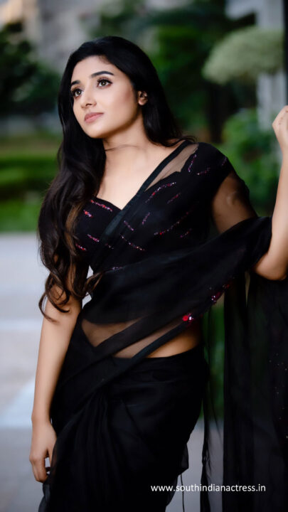 Mirna Menon in black saree photos