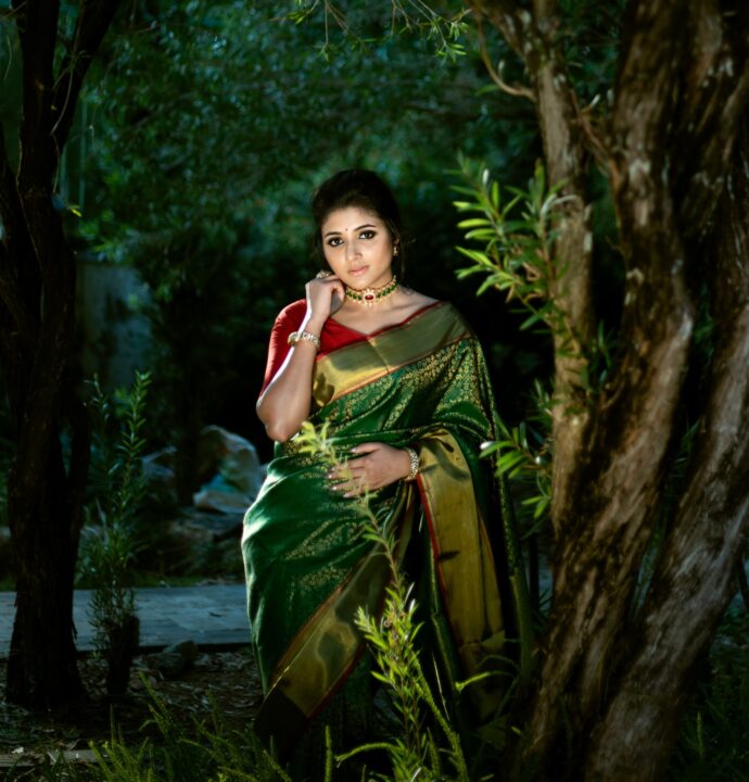 Mirna Menon in green silk saree photos