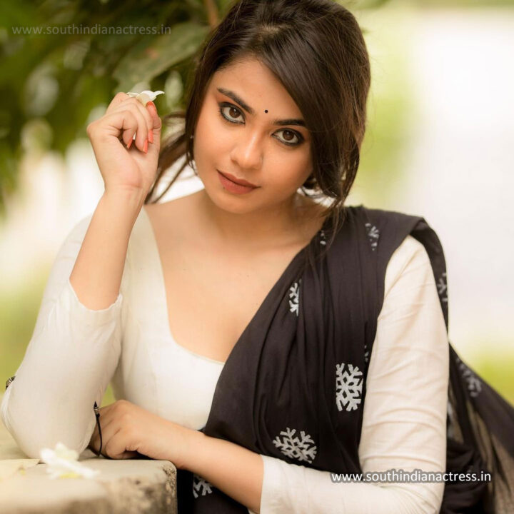 Monica Chinnakotla in black printed saree photos