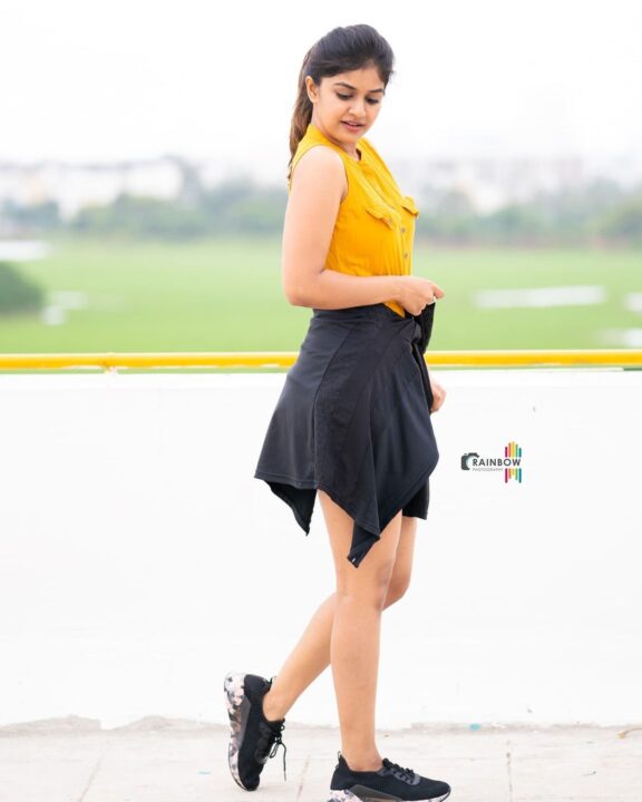 Sanjana Anand in sleeveless mustard jumpsuit shorts